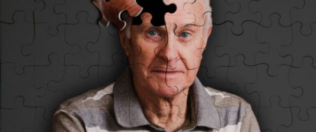 Jigsaw puzzle, of senior man, falling apart